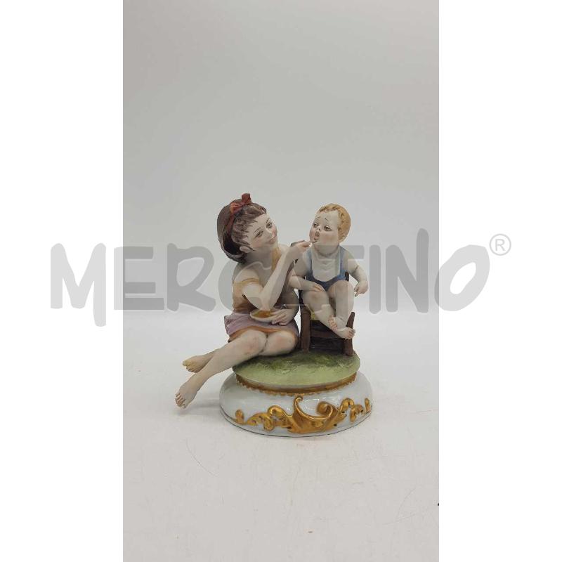 STATUETTA MAMMA CHE IMBOCCA IL SUO BIMBO | Mercatino dell'Usato Putignano 1