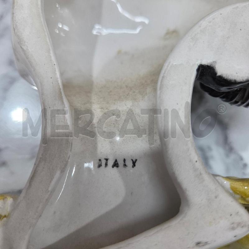 APPENDINO VOLTO DONNA CER CAPELLI NERI BUSTO GIALLO  | Mercatino dell'Usato Benevento 4
