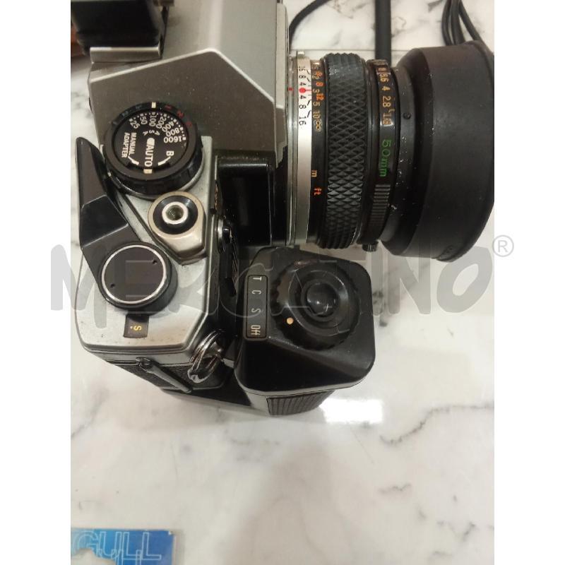 FOTOCAMERA OLYMPUS GRIGIA NERA OM10+DUPLICATORE DI FOCALE | Mercatino dell'Usato Benevento 4
