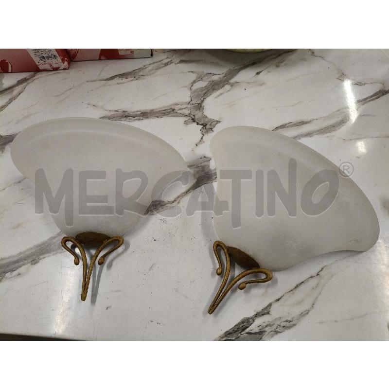 APPLIQUE COPPIA CONO INS FERRO BATTUTO LAM  | Mercatino dell'Usato San giorgio del sannio 1