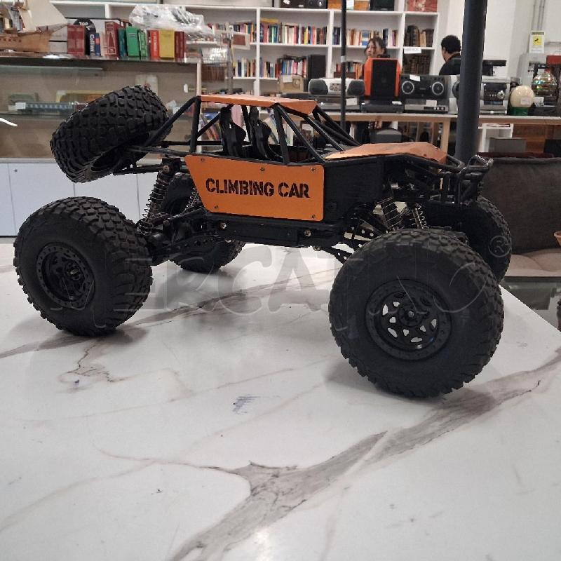 MACCHINA ESPOSTIVA CLIMBING CAR ARANCIO  | Mercatino dell'Usato San giorgio del sannio 1
