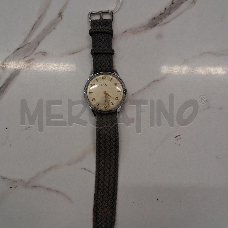 OROLOGIO DA POLSO ETON QUADRANTE ARGENTATO CINTURINO GRIGIO TESSUTO DIFETTI | Mercatino dell'Usato San giorgio del sannio 1