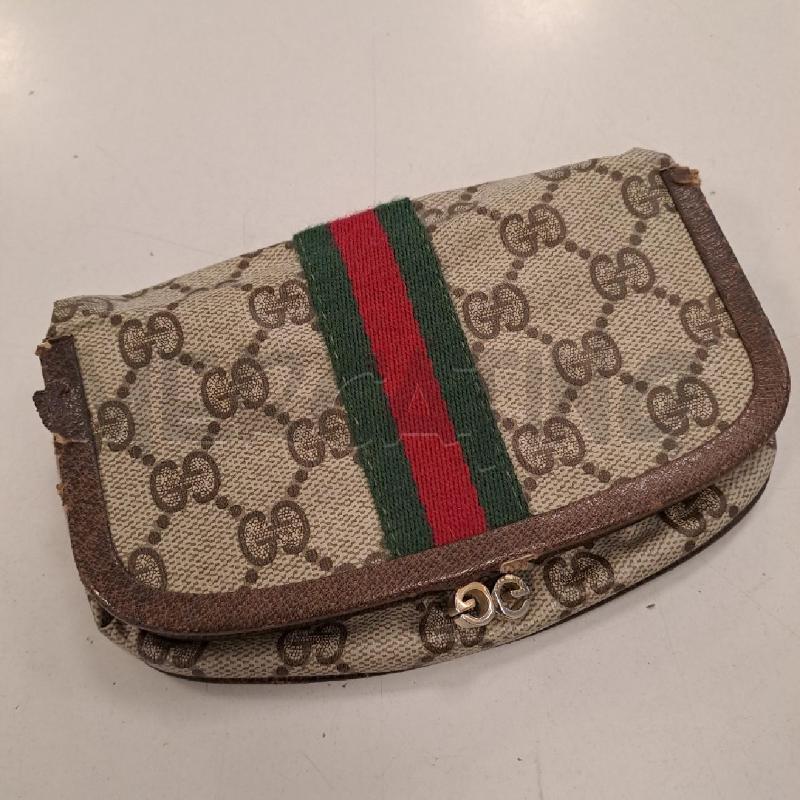 POCHETTE GUCCI PORTATRUCCO DA RESTAURARE | Mercatino dell'Usato Bologna 1