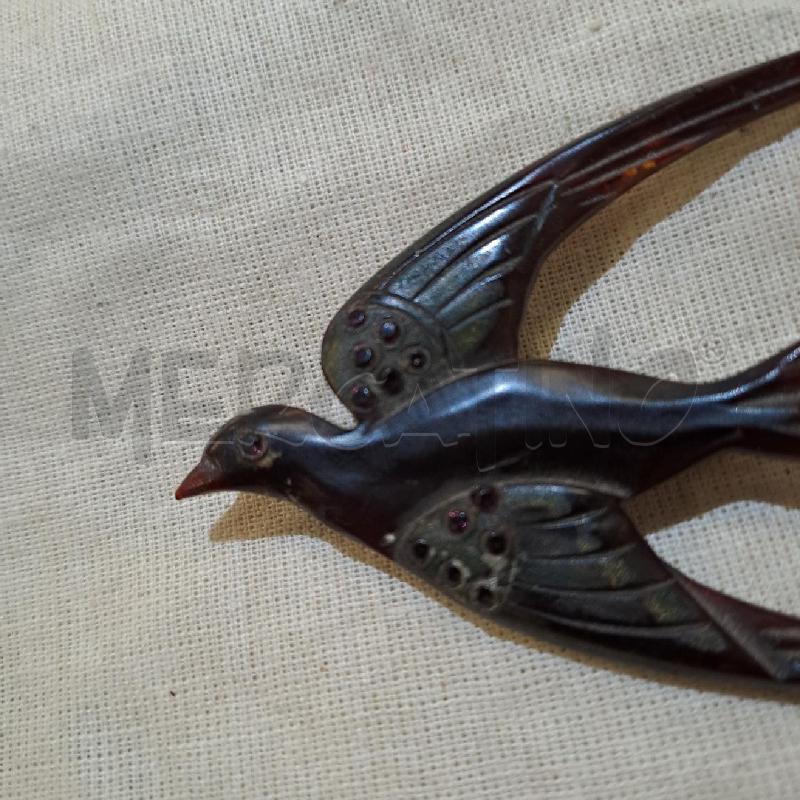 SPILLA MARRONE RESINA RONDINE | Mercatino dell'Usato Bologna 2