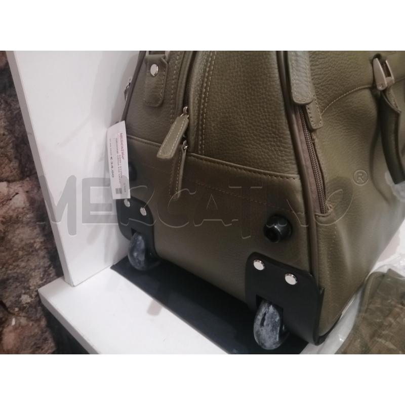 BORSONE ORNA 916 VERDE | Mercatino dell'Usato Catania stazione centrale 3