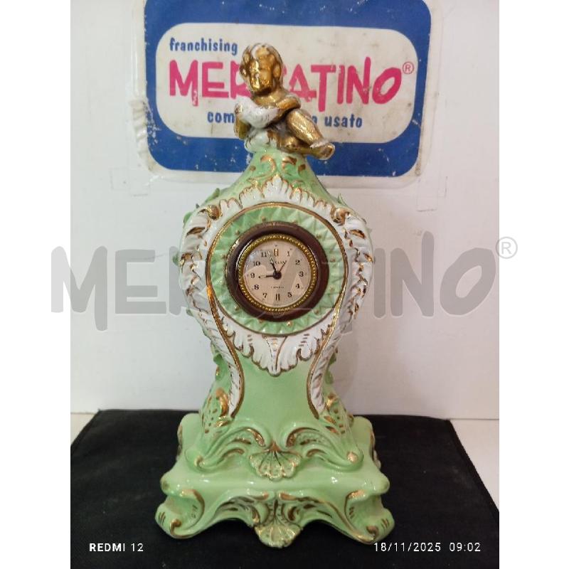 OROLOGIO DA TAVOLO  VERDE CON PUTTO  | Mercatino dell'Usato Catania stazione centrale 1