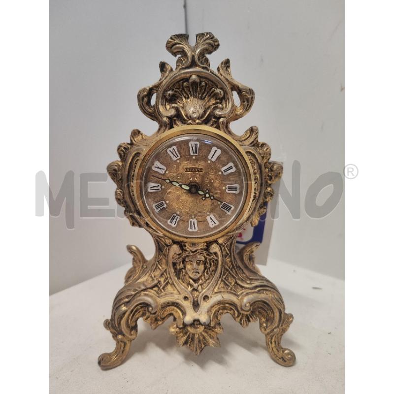OROLOGIO DA TAVOLO TITANUS METALLO 4 PIEDINI DA RISISTEMARE | Mercatino dell'Usato Vinci - fraz. sovigliana 1