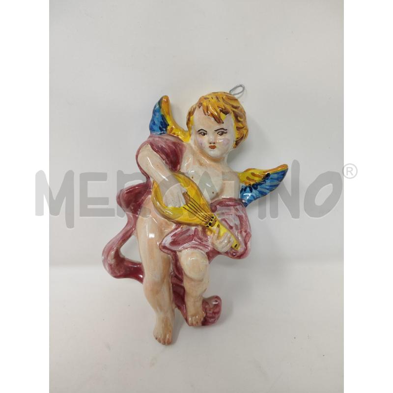 PUTTO CERAMICA CON STRUMENTO MUSICALE  | Mercatino dell'Usato Vinci - fraz. sovigliana 1