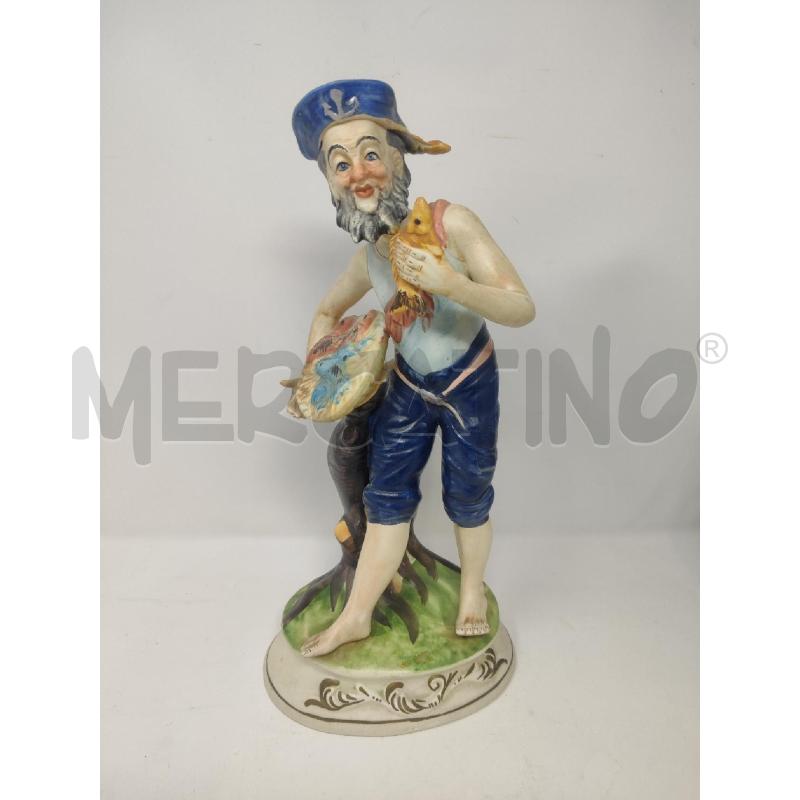 STATUA UOMO CON PESCE CAPODIMONTE H.34 | Mercatino dell'Usato Vinci - fraz. sovigliana 1