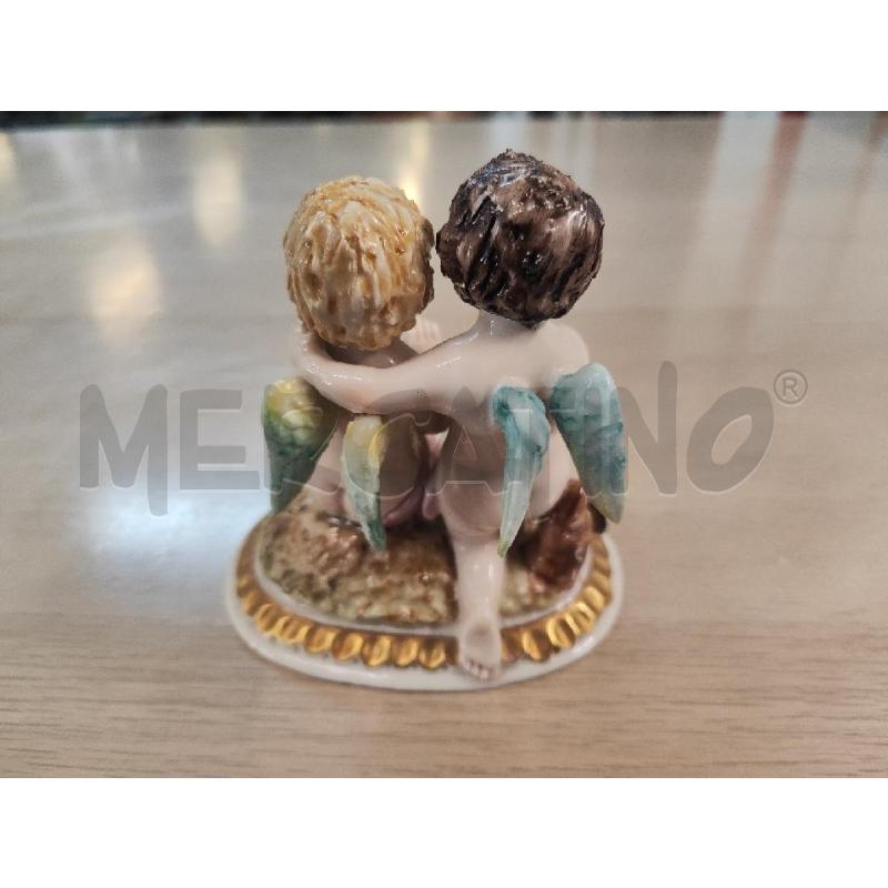 STATUETTA COPPIA PUTTINI CAPODIMONTE CON ASCIA | Mercatino dell'Usato Vinci - fraz. sovigliana 2