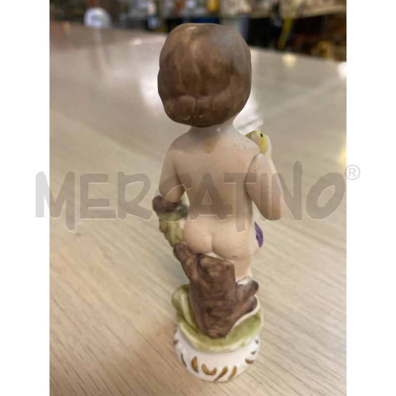 STATUETTA PUTTINI CON PULCINO CAPODIMONTE | Mercatino dell'Usato Vinci - fraz. sovigliana 2