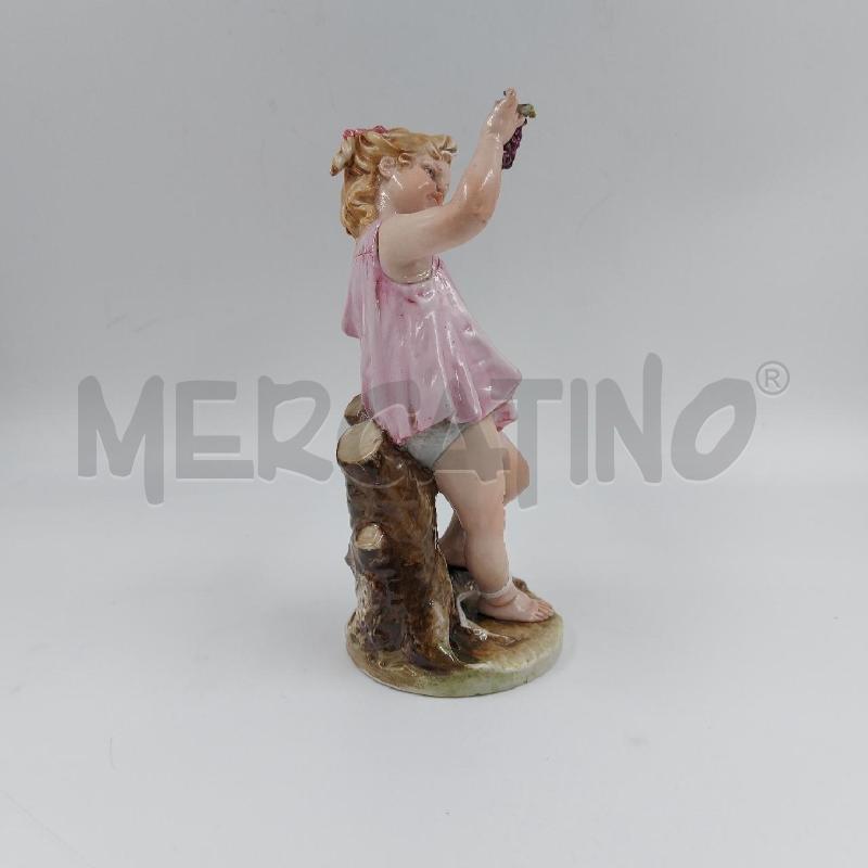 STATUINA BIMBA CON UVA CAPO MERL | Mercatino dell'Usato Genova sampierdarena 2