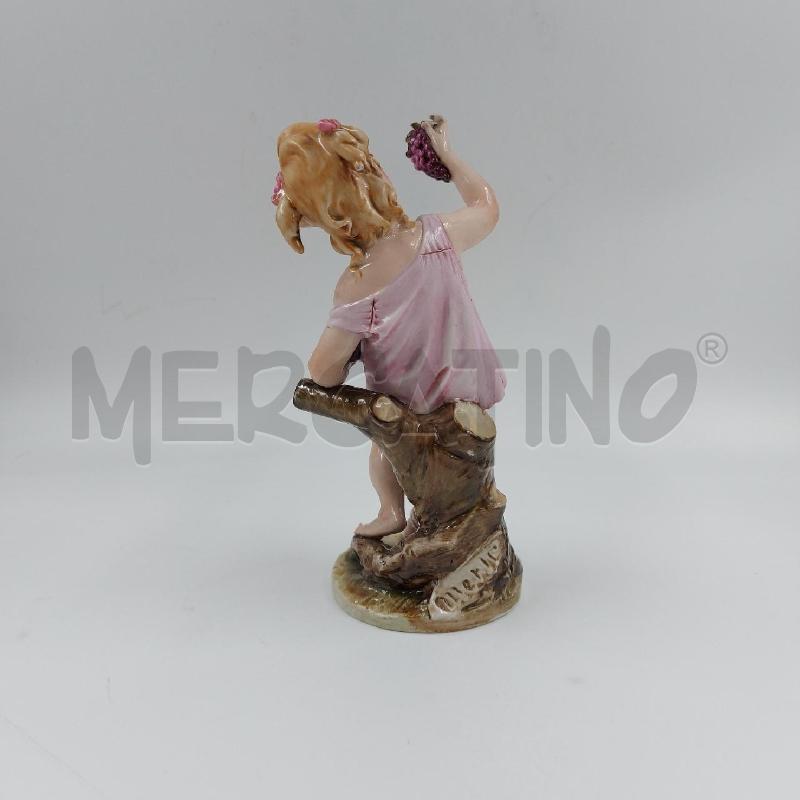 STATUINA BIMBA CON UVA CAPO MERL | Mercatino dell'Usato Genova sampierdarena 3