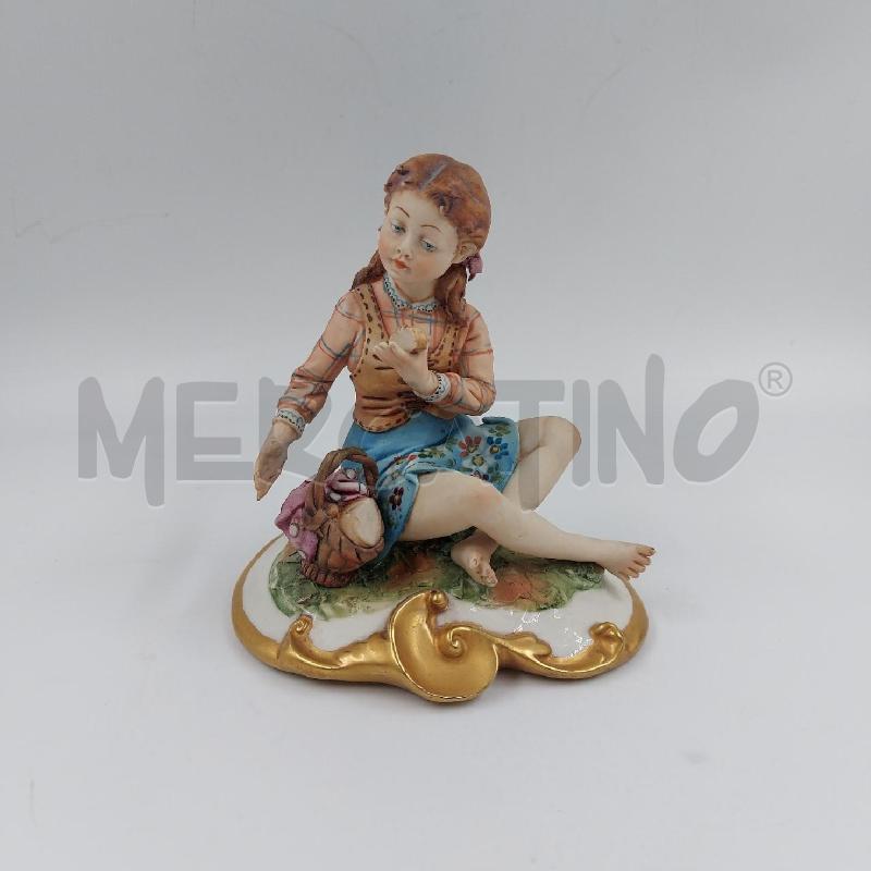 STATUINA BIMBA SEDUTA CON PANE CAPO VOLTA | Mercatino dell'Usato Genova sampierdarena 1