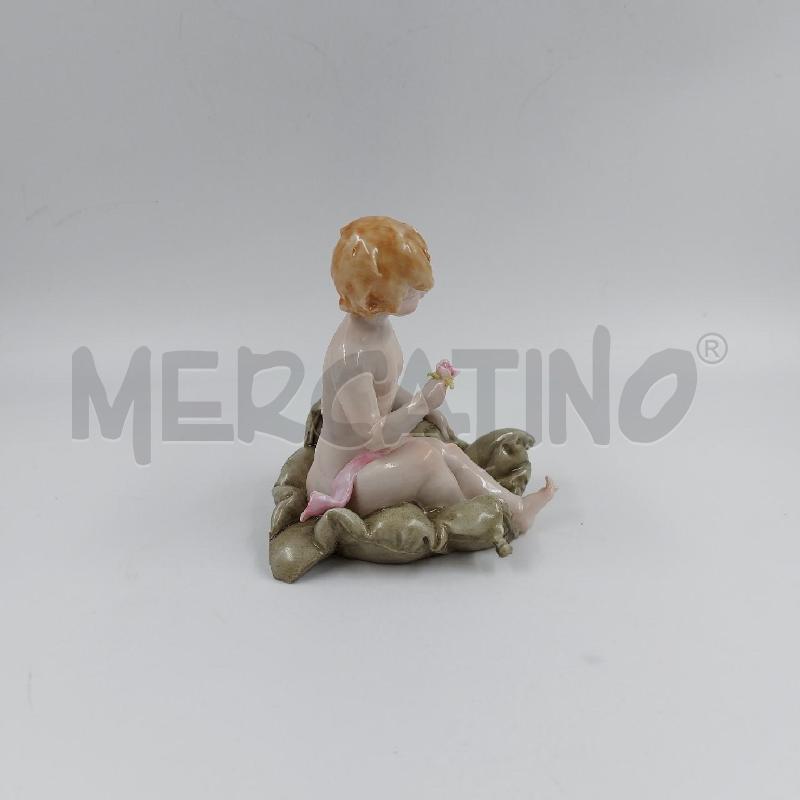 STATUINA BIMBA SU CUSCINO CAPO  | Mercatino dell'Usato Genova sampierdarena 2