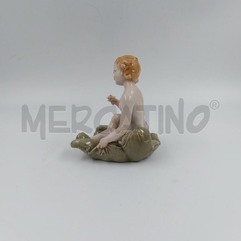 STATUINA BIMBA SU CUSCINO CAPO  | Mercatino dell'Usato Genova sampierdarena 4