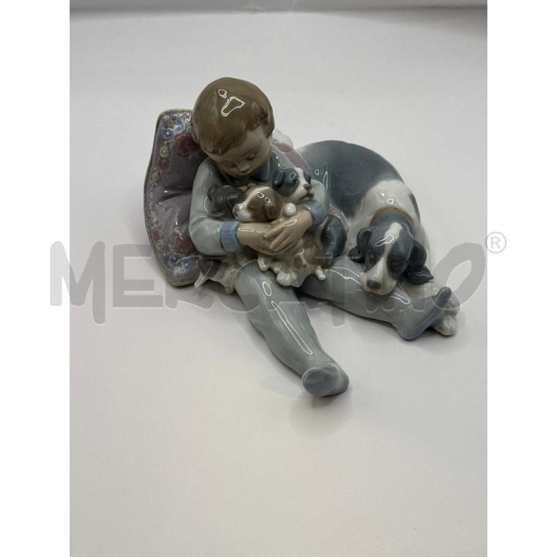 STATUINA LLADRO RAGAZZO CHE DORME CON  | Mercatino dell'Usato Genova sampierdarena 1