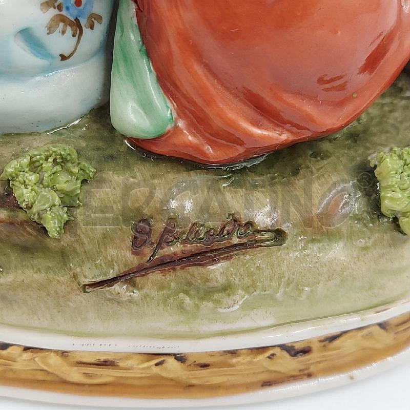 STATUINA LUI E LEI SEDUTI CON FIORI CAPO | Mercatino dell'Usato Genova sampierdarena 5