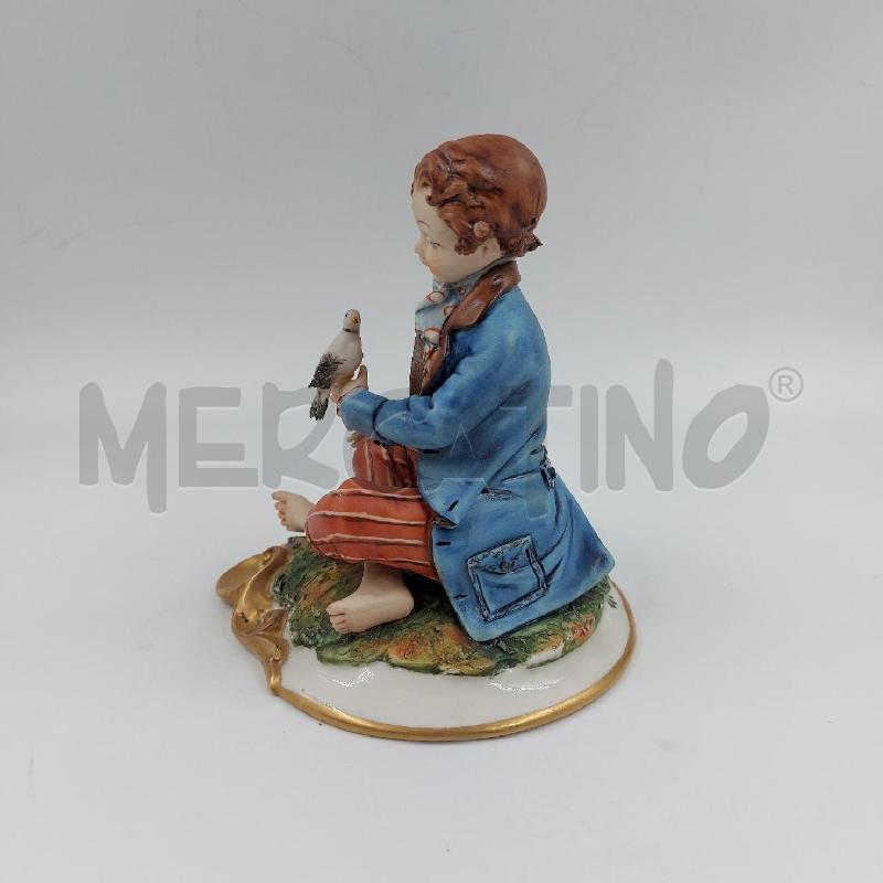 STATUINA RAGAZZO CON UCCELLINO CAPO VOLTA | Mercatino dell'Usato Genova sampierdarena 2