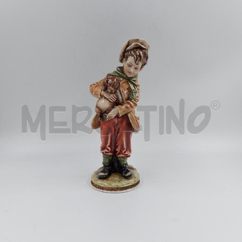 STATUINA RAGAZZO ON CANE MERLO CPAO | Mercatino dell'Usato Genova sampierdarena 1