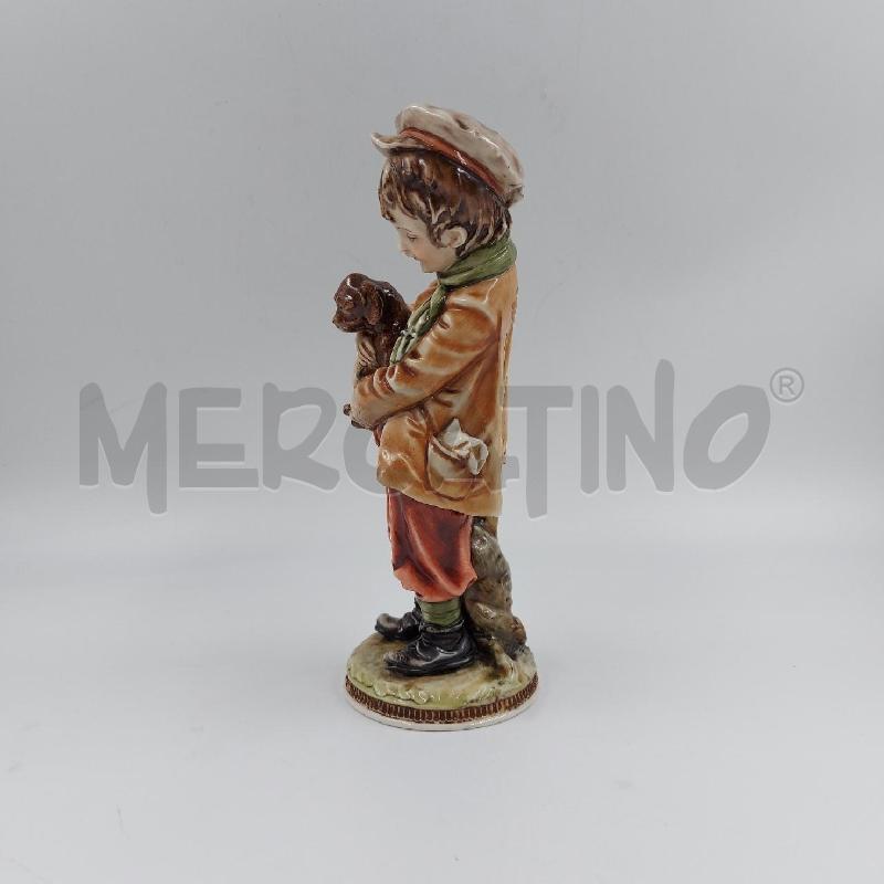 STATUINA RAGAZZO ON CANE MERLO CPAO | Mercatino dell'Usato Genova sampierdarena 2