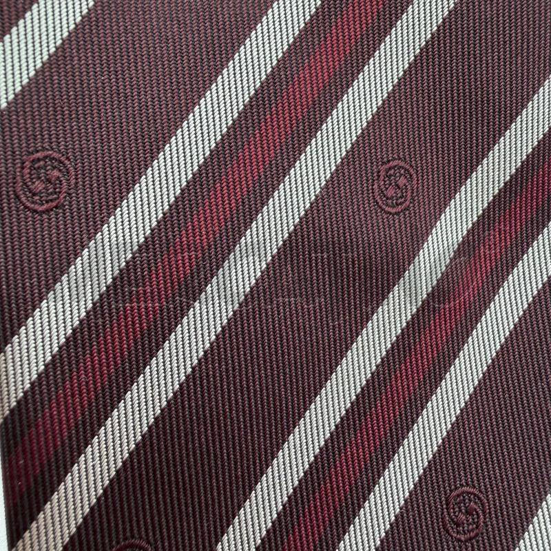 CRAVATTA GUCCI STRISCE BORGOGNA/ROSSO/ECRU LOGO | Mercatino dell'Usato Corbetta 4