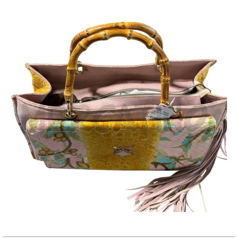 BORSA PELLE CON MANICI IN BAMBOO | Mercatino dell'Usato Carrara 2