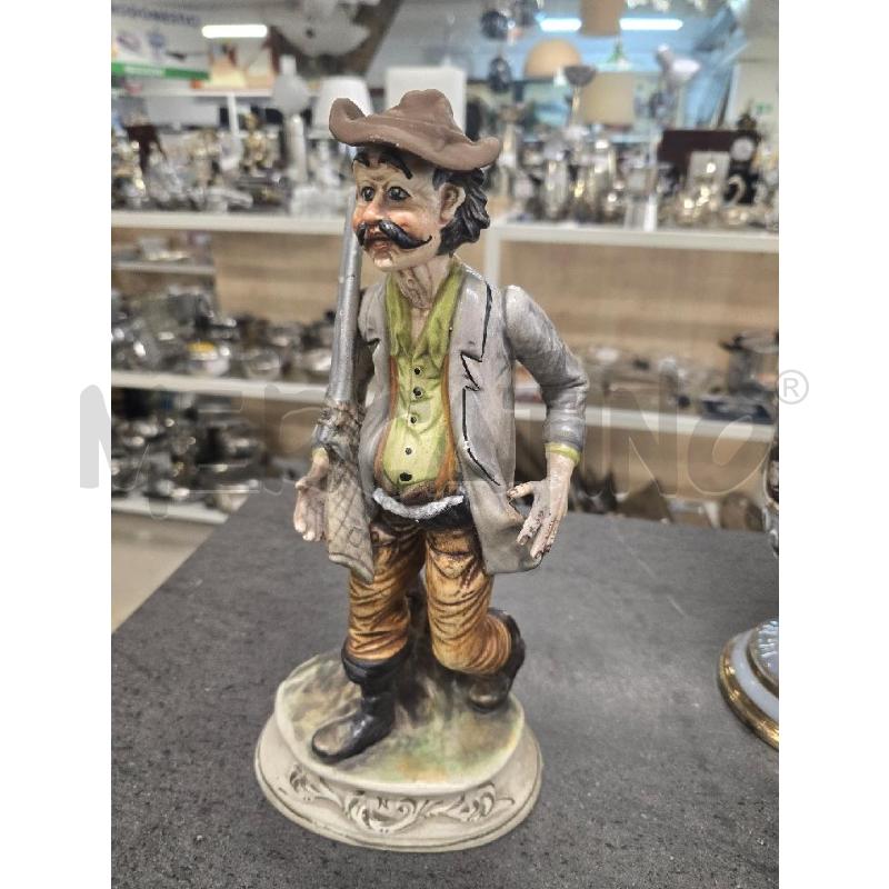 STATUINA CACCIATORE GIACCA GRIGIA BASE BIANCA | Mercatino dell'Usato Acerra 1