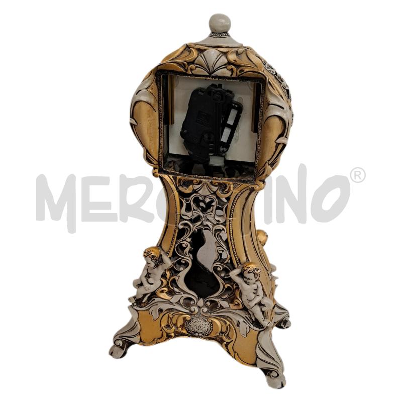 OROLOGIO RESINA PUTTI DORATI TRAFORATO DEL VECCHIO  | Mercatino dell'Usato Ottaviano 2