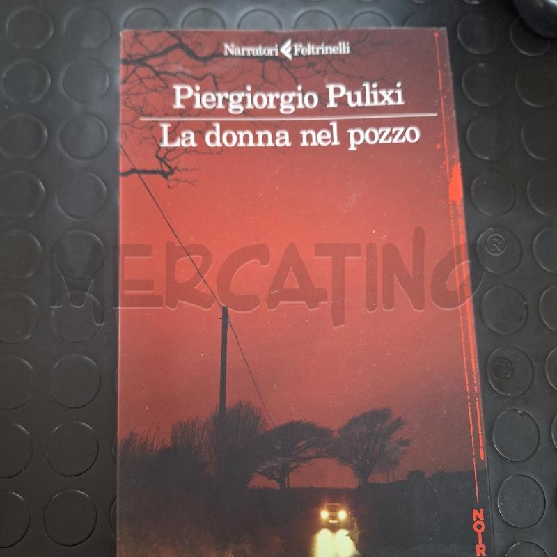 PIERGIORGIO PULIXI - LA DONNA NEL POZZO | Mercatino dell'Usato Ottaviano 1