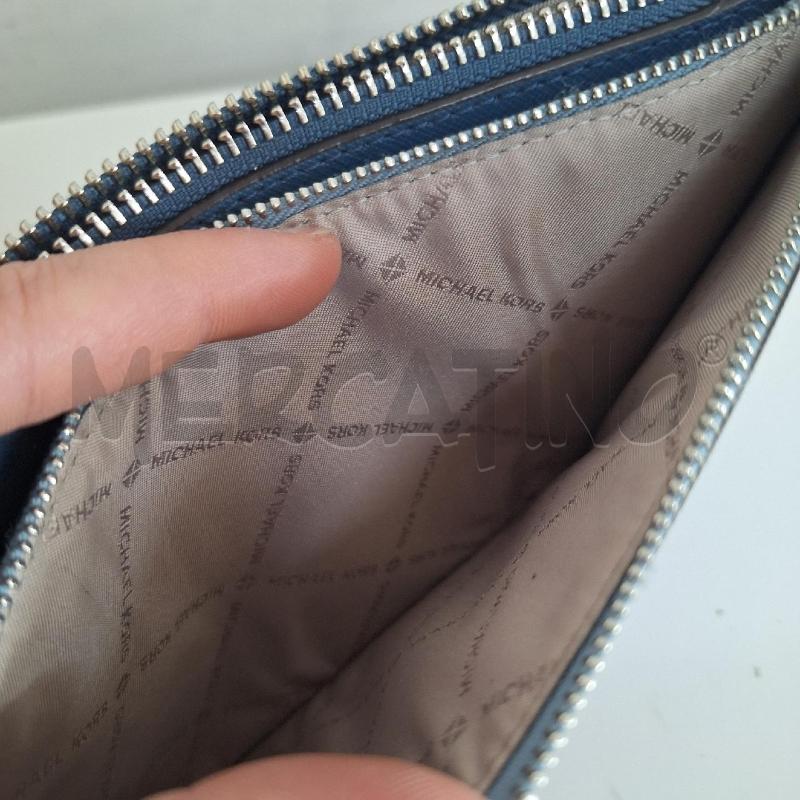 POCHETTE MICHAEL KORS CELESTE BLU  | Mercatino dell'Usato Ottaviano 5