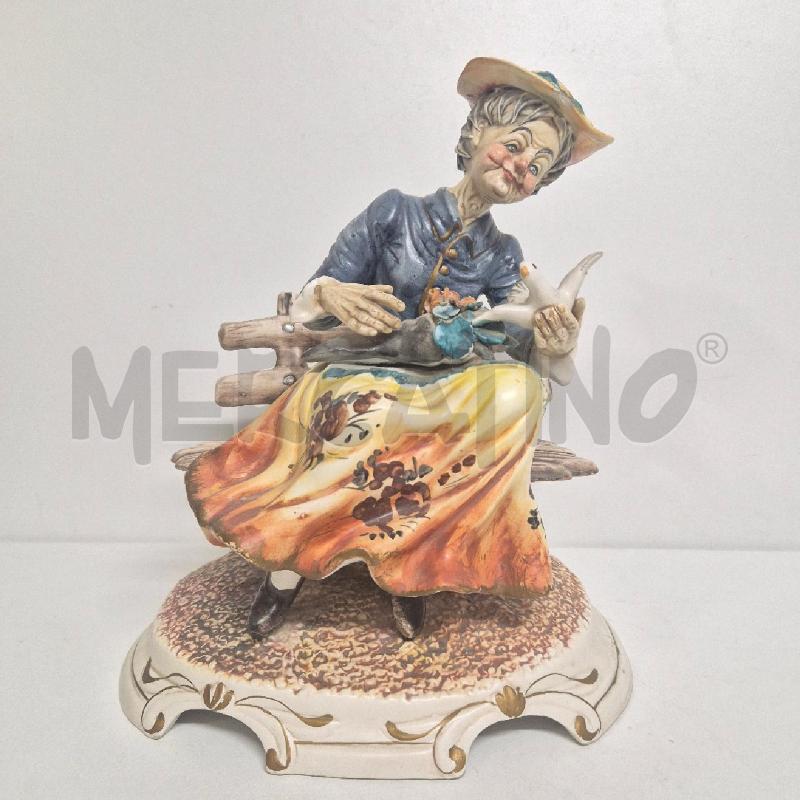 STATUINA CERAMICA DONNA SU PANCHINA CON COLOMBA | Mercatino dell'Usato Cervia 1