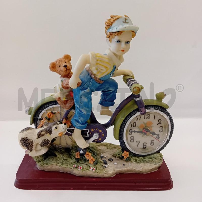 SOPRAMMOBILE BIMBO SU BICICLETTA+ OROLOGIO | Mercatino dell'Usato Cesenatico 1