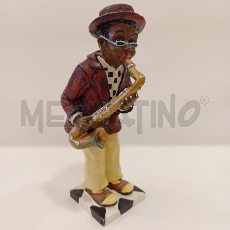 STATUINA SUONATORE SAX RESINA | Mercatino dell'Usato Cesenatico 2