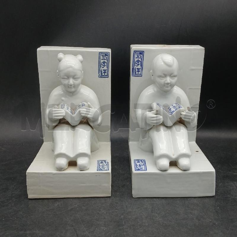 COPPIA FERMALIBRI CERAMICA PERSONAGGI CIN | Mercatino dell'Usato Roma garbatella 1