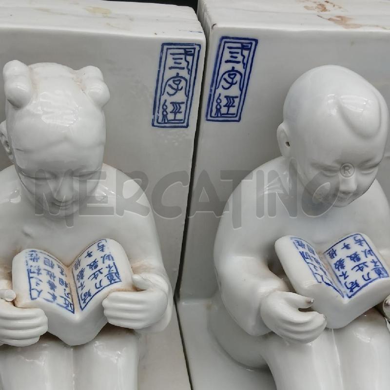 COPPIA FERMALIBRI CERAMICA PERSONAGGI CIN | Mercatino dell'Usato Roma garbatella 5