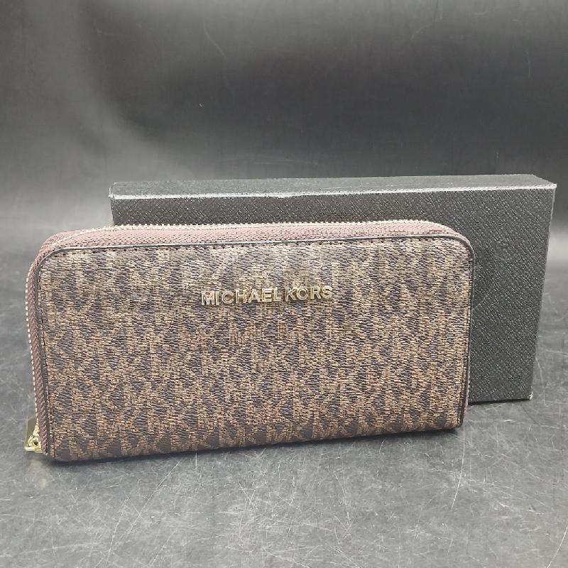 PORTA FOGLIO MICHAEL KORS MARRONE MONOGRAM LOGO DORATO  | Mercatino dell'Usato Roma garbatella 1