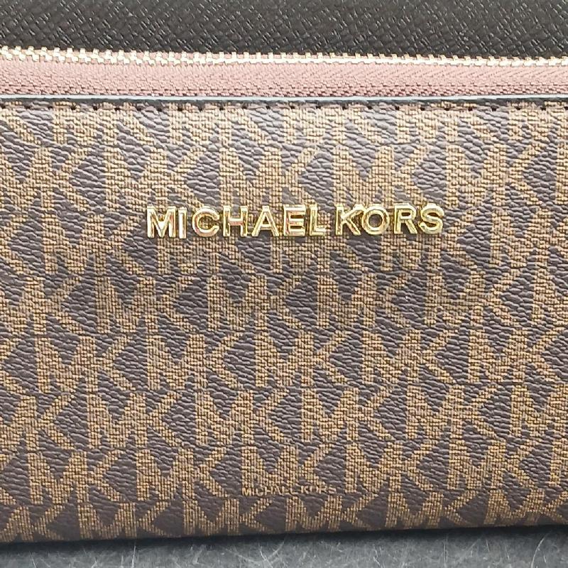 PORTA FOGLIO MICHAEL KORS MARRONE MONOGRAM LOGO DORATO  | Mercatino dell'Usato Roma garbatella 2