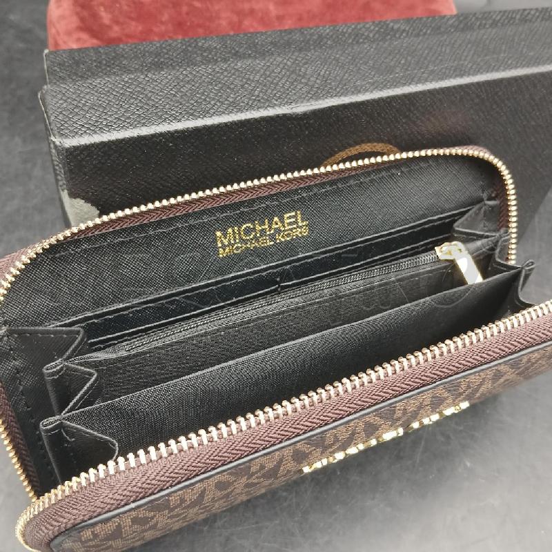 PORTA FOGLIO MICHAEL KORS MARRONE MONOGRAM LOGO DORATO  | Mercatino dell'Usato Roma garbatella 3
