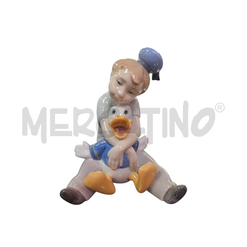 STATUINA NAO BAMBINO SOGNANTE CON PAPERINO | Mercatino dell'Usato Roma appia 1