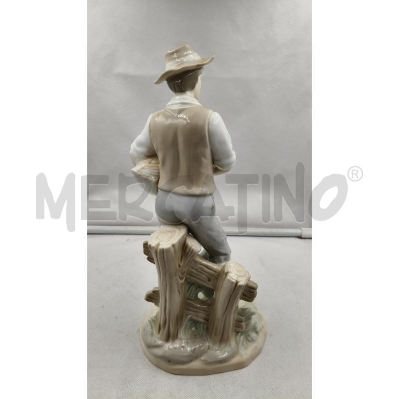 STATUINA CER UOMO OCHE  | Mercatino dell'Usato Roma talenti 3