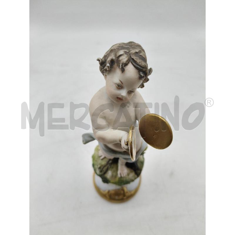 STATUINA PUTTINO SUONATORE CER CAPOD  | Mercatino dell'Usato Roma talenti 2