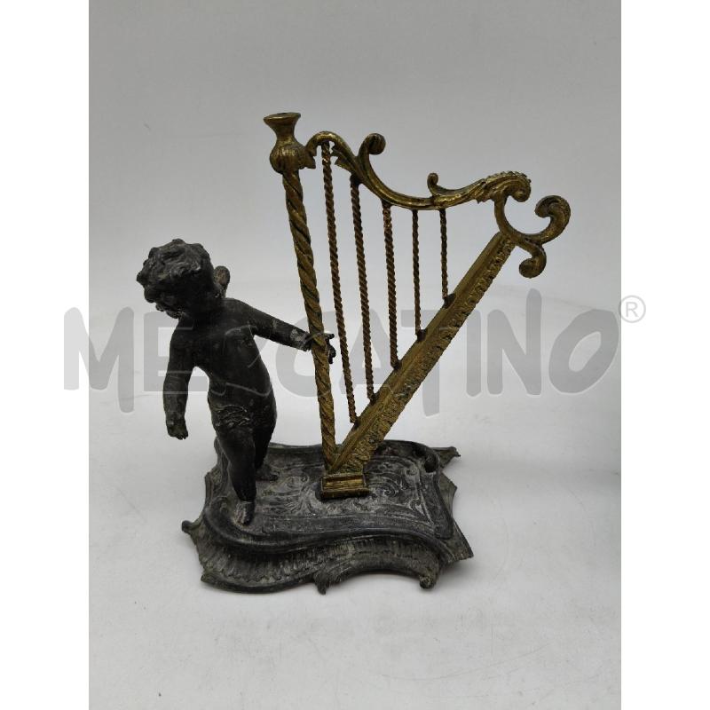 STATUINA PUTTINO SUONATORE CROMO EP DA RIV  | Mercatino dell'Usato Roma talenti 1