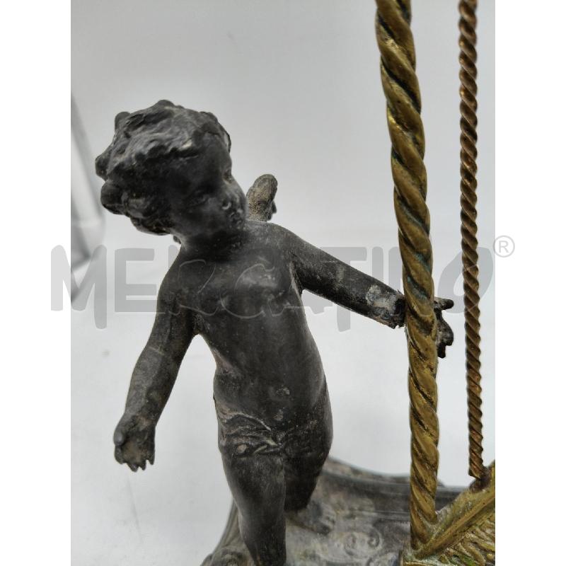 STATUINA PUTTINO SUONATORE CROMO EP DA RIV  | Mercatino dell'Usato Roma talenti 2