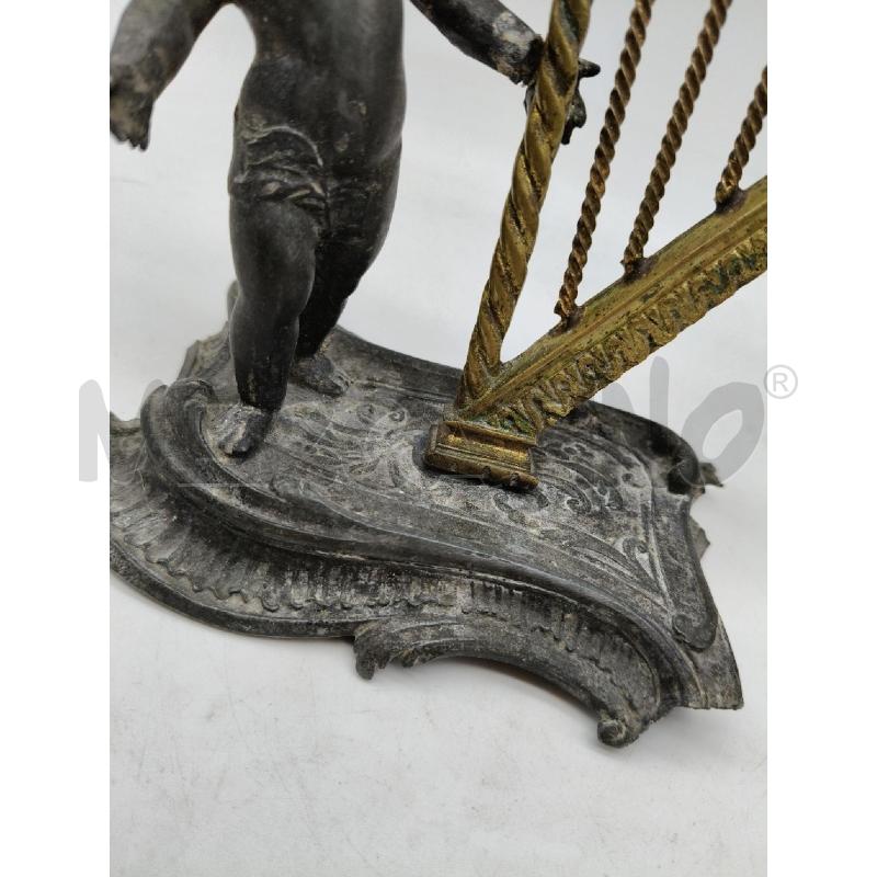STATUINA PUTTINO SUONATORE CROMO EP DA RIV  | Mercatino dell'Usato Roma talenti 3