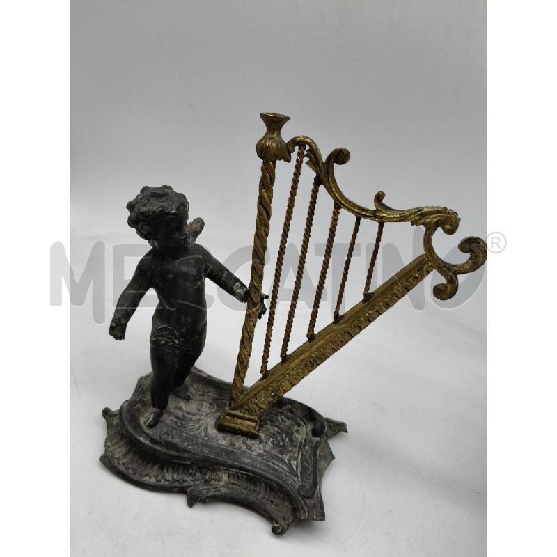 STATUINA PUTTINO SUONATORE CROMO EP DA RIV  | Mercatino dell'Usato Roma talenti 4