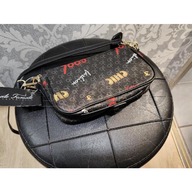 TRACOLLINA ROCCOBAROCCO NER  SCRITTE COL MODRBR910B0110 | Mercatino dell'Usato Roma talenti 4