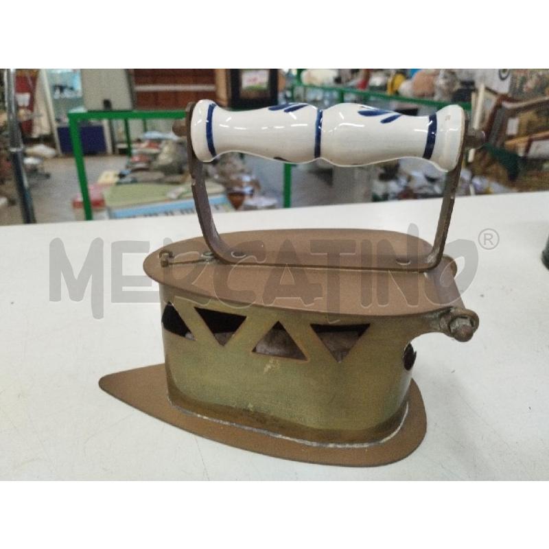 FERRO DA STIRO OTTONATO MANICO CERAMICA | Mercatino dell'Usato Roma zona marconi 1