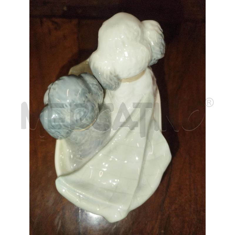 STATUINA CAGNOLINI IN LATTA POIS NAO  | Mercatino dell'Usato Roma zona marconi 4