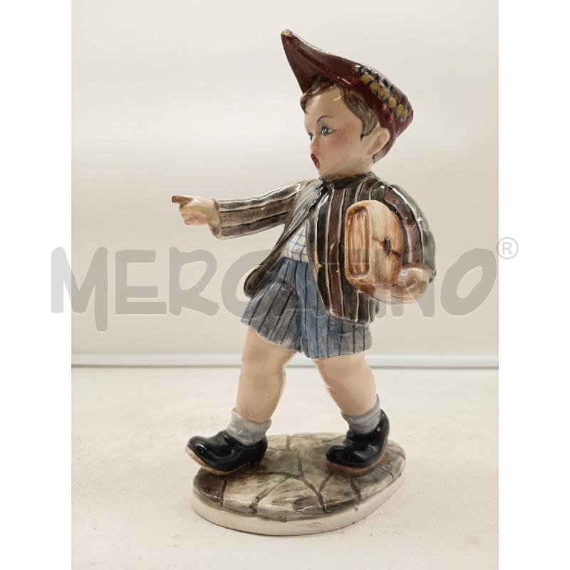 STATUINA CERAMICA BIMBO CON CARTELLA DIFETTI | Mercatino dell'Usato Roma porta maggiore 1